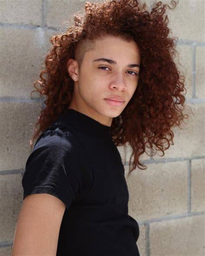 Jaylin Fletcher is posing for the photo.